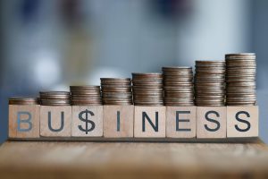 Tower of coin investment chart closeup background. Business education webinar concept.